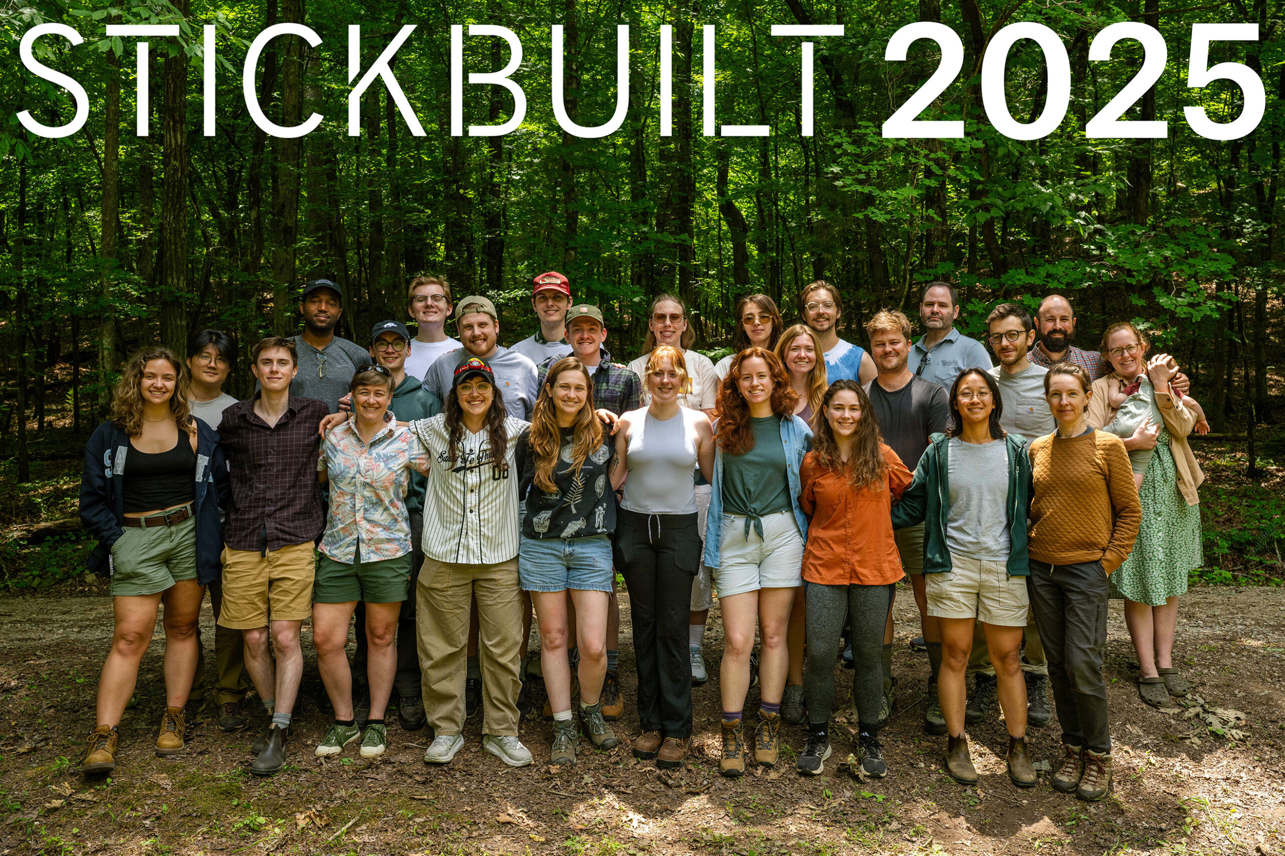 GroupShotlogo@0.33x StickBuilt 2025 class: a group of architects and architectural students pose for a picture in the woods